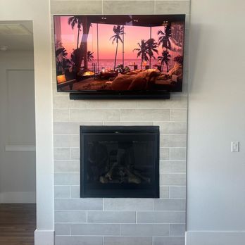 Dallas TV Installers - Sony - 65" Class BRAVIA XR A95K 4K HDR OLED TV and Sonos ARC Soundbar Mounted on Tile in Frisco. Purchased from Dallas TV Installers. - Home Theatre Installation Near Me Dallas TV Installers - Sony - 65" Class BRAVIA XR A95K 4K HDR OLED TV and Sonos ARC Soundbar Mounted on Tile in Frisco. Purchased from Dallas TV Installers. - Home Theatre Installation Near Me