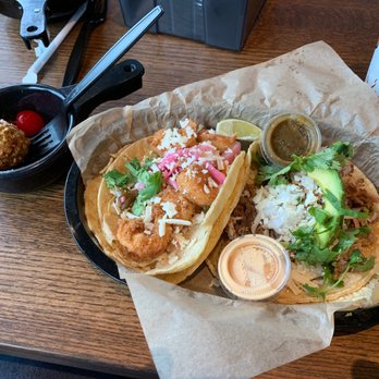 Torchy's Tacos - Baja Shrimp Taco and Green Chili Pork Taco. - Tacos Near Me - Fayetteville, Arkansas Torchy's Tacos - Baja Shrimp Taco and Green Chili Pork Taco. - Tacos Near Me - Fayetteville, Arkansas