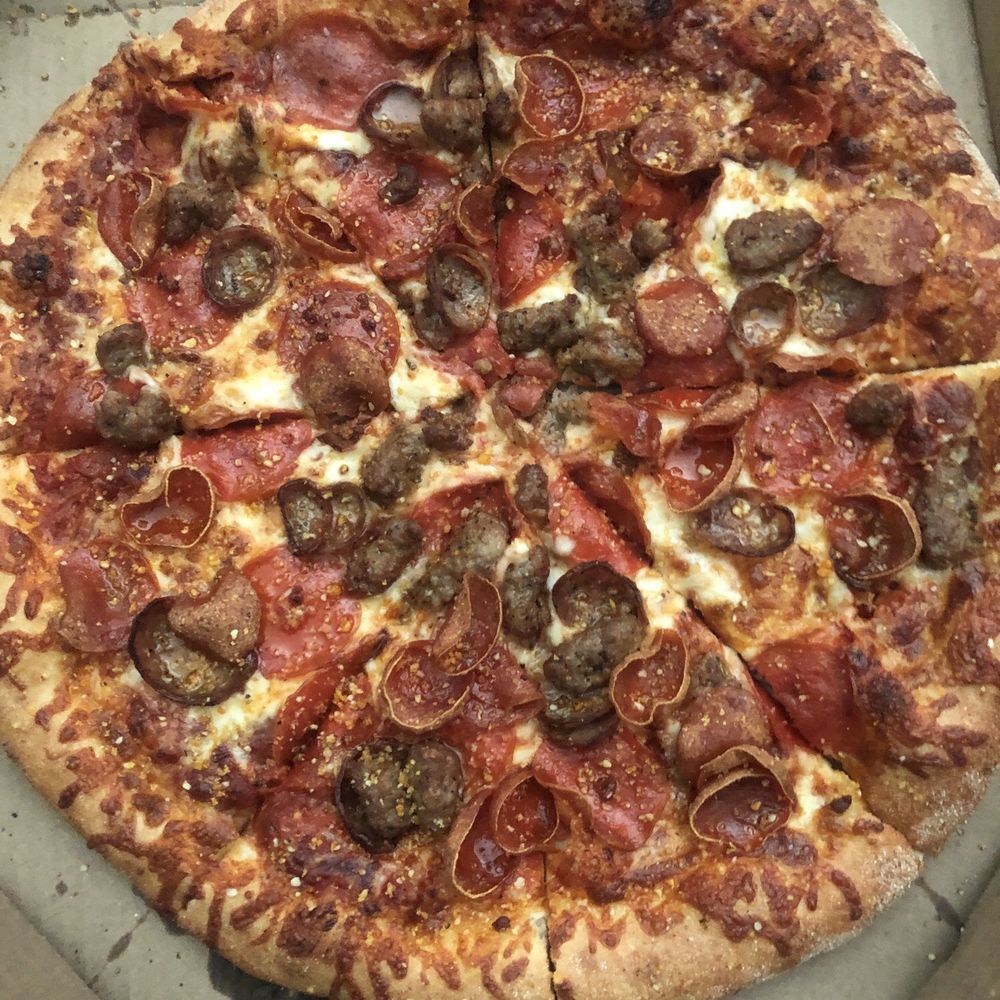 Ultimate magnifico..or something like that. It has 2 kinds of pepperoni and 2 kinds of sausage:/