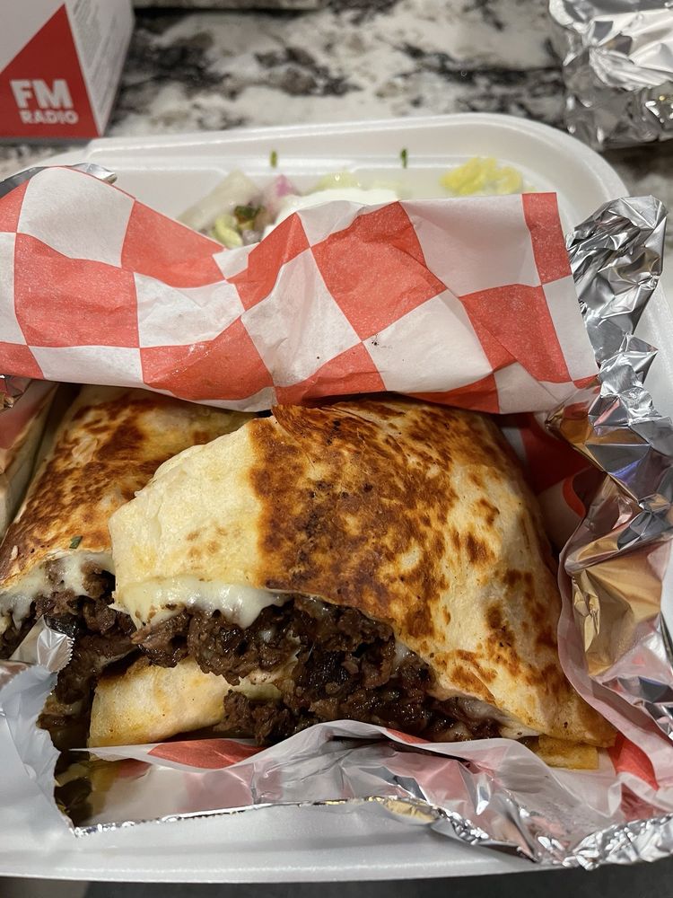 Tacos El Iturbidense Logo