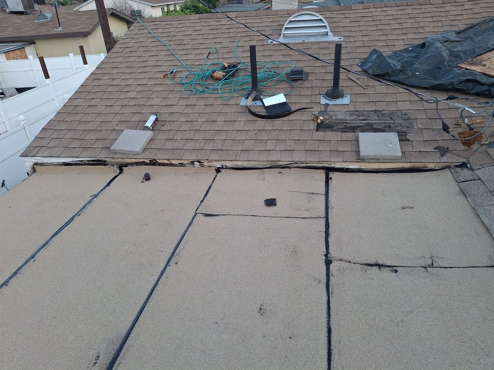 Slide of Alexander’s Roofing