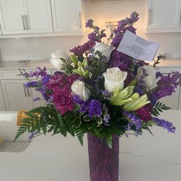 Front of the flowers. Day of delivery.
