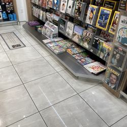 The Charlotte Observer - Barren airport newsstand. no newspapers in the entire airport