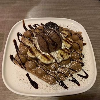Sugar Marmalade - Chocolate egg waffle with chocolate ice cream on top - Desserts Near Me - Calgary, Alberta Sugar Marmalade - Chocolate egg waffle with chocolate ice cream on top - Desserts Near Me - Calgary, Alberta