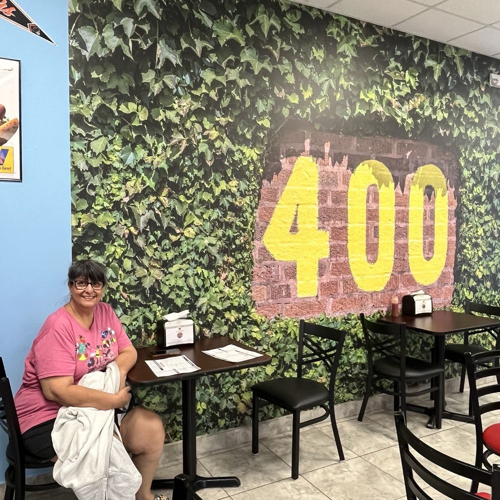 Fat Lou’s - Wrigley outfield wall - Hot Dogs Near Me - Plantation, Florida