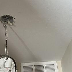 ASAP Drywall - After photo from repair work. Ceiling texture was matched as well.