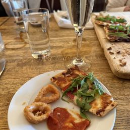 Calamari, fig prosciutto arugula Artisanal Flatbread