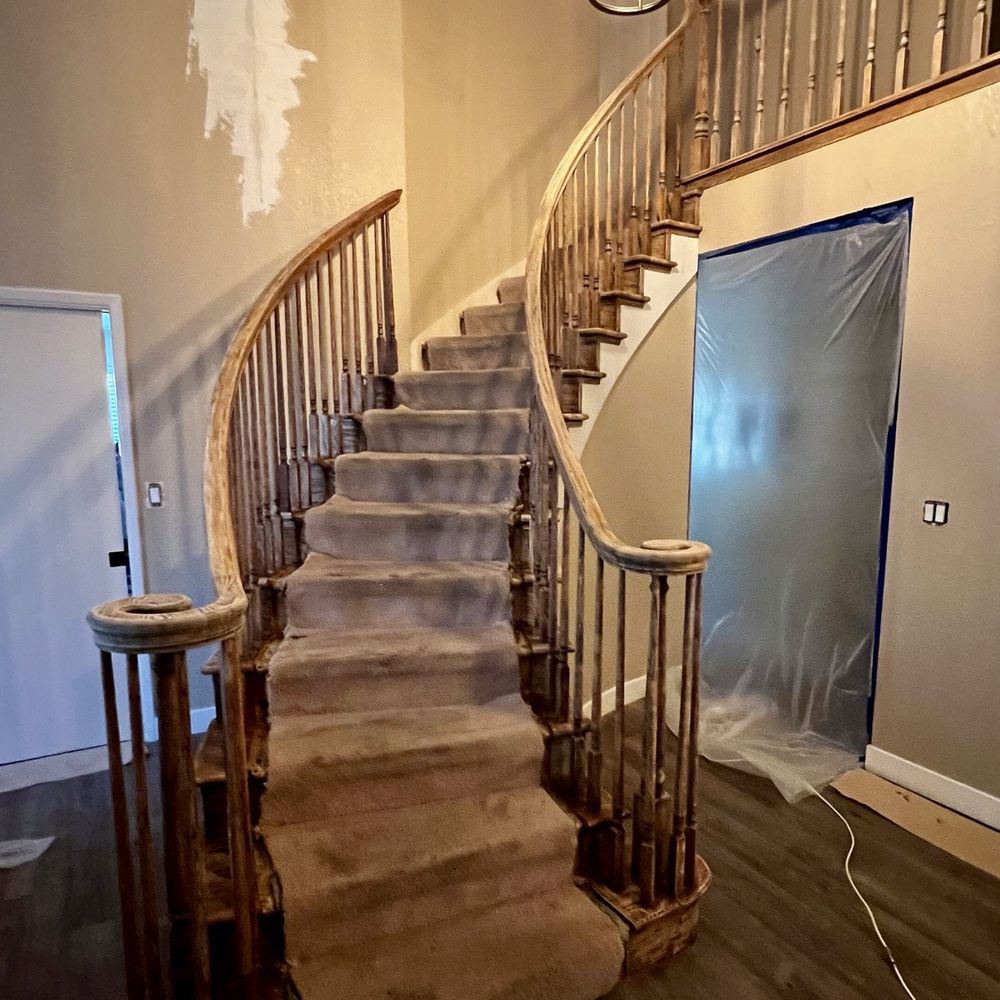 4Bay Painting - Getting started on the oak staircase by sanding and removing multiple layers of verathane, as well as repairing cracked walls. - Painters Near Me 4Bay Painting - Getting started on the oak staircase by sanding and removing multiple layers of verathane, as well as repairing cracked walls. - Painters Near Me