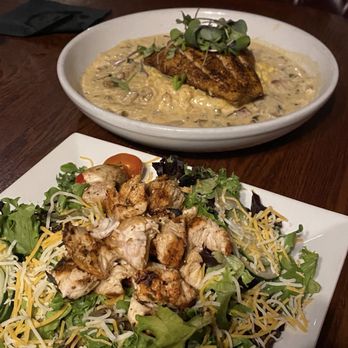 Churchill's - Salad with Blackened Chicken and Snapper with Grits - Pubs Near Me - Savannah, Georgia Churchill's - Salad with Blackened Chicken and Snapper with Grits - Pubs Near Me - Savannah, Georgia