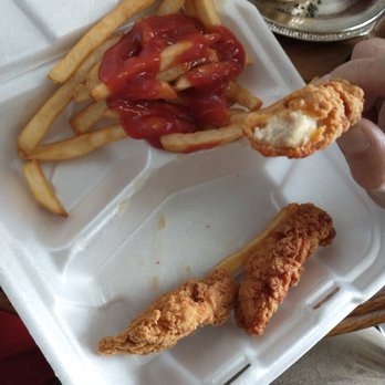 Ernie's Irish Pub - a chicken nuggs and fries in a styrofoam container - Pubs Near Me - Escanaba, Michigan