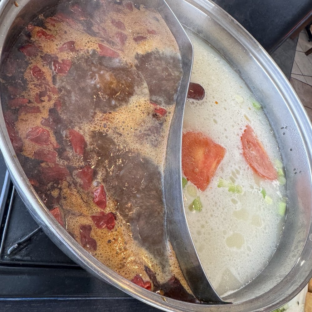 Szechuan House - Half spicy half creamy hotpot broth - Chinese Near Me - Columbia, Missouri Szechuan House - Half spicy half creamy hotpot broth - Chinese Near Me - Columbia, Missouri