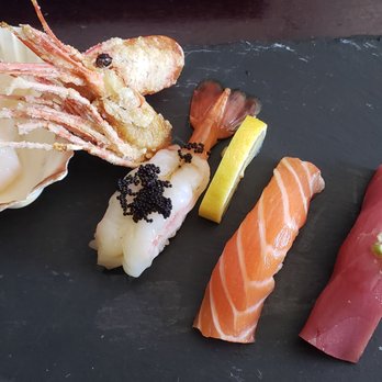 SkyBay Sushi - various types of sushi on a slate board - Sushi Bars Near Me - Costa Mesa, California SkyBay Sushi - various types of sushi on a slate board - Sushi Bars Near Me - Costa Mesa, California