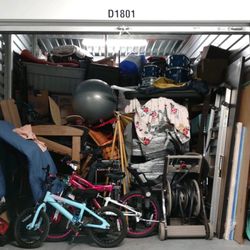 Two Men and a Truck Las Vegas - Manager sent them back to "fix" the problem. I came back to this. Organized, but still loose items & TV on floor. $1500 drumset up there