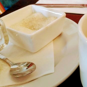 Tula Kitchen - small milk pitcher and granulated sugar in square container - Vegan Near Me - Bay Shore, New York