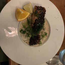 Salmon with black sesame on creamy cauliflower
