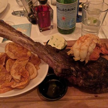 Strip Steakhouse - Wagyu Tomahawk Ribeye with Lobster Tail - Steakhouses Near Me - Avon, Ohio Strip Steakhouse - Wagyu Tomahawk Ribeye with Lobster Tail - Steakhouses Near Me - Avon, Ohio