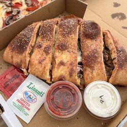 Romanos Pizza - Sausage and mushroom calzone