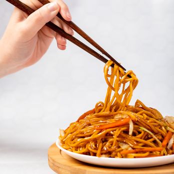 Leeann Chin - a plate of noodles with chopsticks - Chinese Near Me - Minnetonka, Minnesota Leeann Chin - a plate of noodles with chopsticks - Chinese Near Me - Minnetonka, Minnesota