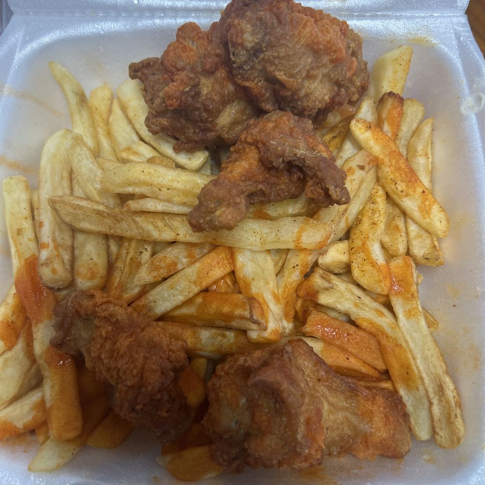 Golden Ox 2 - As you can see in this photo, Golden Ox#2 in Pomona on holt. These hot buffalo wings aren't wet, or fresh. Fries are old no crunch. - American Near Me - Pomona, California