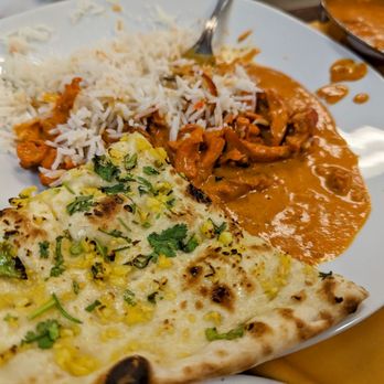 Mustang House - a plate of food with rice and chicken - Himalayan/Nepalese Near Me - Raleigh, North Carolina Mustang House - a plate of food with rice and chicken - Himalayan/Nepalese Near Me - Raleigh, North Carolina