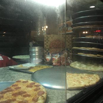 Eagles Pizza Downtown - Stack of pizza - Pizza Near Me - Orlando, Florida Eagles Pizza Downtown - Stack of pizza - Pizza Near Me - Orlando, Florida
