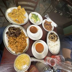 Bonao Restaurant - Morro with Steak and Onions White rice and Beans and Caldo for the Tostones and Rice
