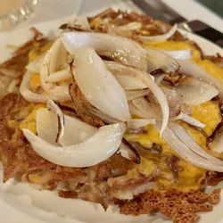 The Steakout - Hash Browns with cheese and onions