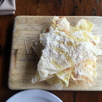 Uva - Paper Thin Sardinian Flat Bread with Extra Virgin Olive Oil and Parmigiano. Soooo good! - Italian Near Me - New York, New York Uva - Paper Thin Sardinian Flat Bread with Extra Virgin Olive Oil and Parmigiano. Soooo good! - Italian Near Me - New York, New York