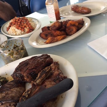 La Esquina Criolla - Skirt steak flank steak and short ribs with yellow plantains. Rice and beans and sausage. - Argentine Near Me - Elmhurst, New York La Esquina Criolla - Skirt steak flank steak and short ribs with yellow plantains. Rice and beans and sausage. - Argentine Near Me - Elmhurst, New York