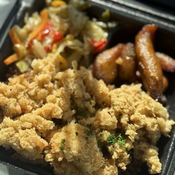 Flamin Grill & Cafe - Cracked Conch, rice and beans, cabbage and plantain - Cafes Near Me - Lauderhill, Florida Flamin Grill & Cafe - Cracked Conch, rice and beans, cabbage and plantain - Cafes Near Me - Lauderhill, Florida