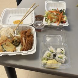 Chicken Katsu, tempura, salad, California rolls. Chicken Katsu, tempura, salad, California rolls.