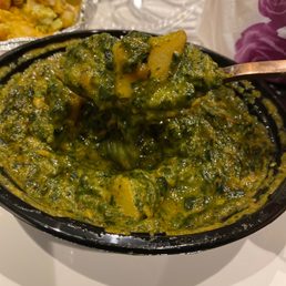 The Aloo Saag is slimy, overcooked, and rife with burnt garlic. The Aloo Saag is slimy, overcooked, and rife with burnt garlic.