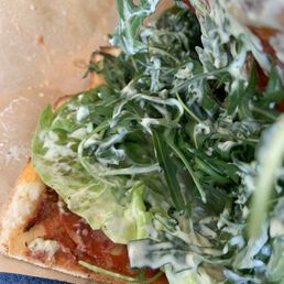Inside spicy salami pizza sandwich