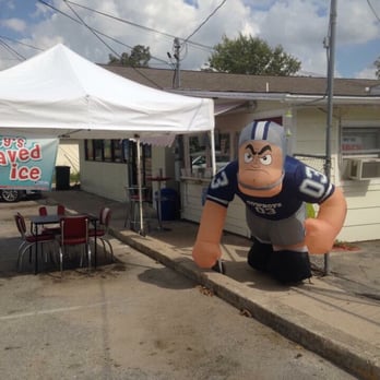 Marty's Shaved Ice & More - a giant inflatable football player - Shaved Ice Near Me - Kyle, Texas