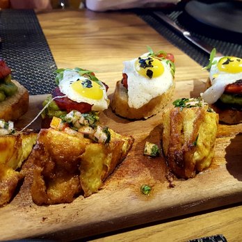 Sabio on Main - Chorizo, quail egg, avocado and Sriracha... I could eat these all day...and night - New American Near Me - Pleasanton, California Sabio on Main - Chorizo, quail egg, avocado and Sriracha... I could eat these all day...and night - New American Near Me - Pleasanton, California