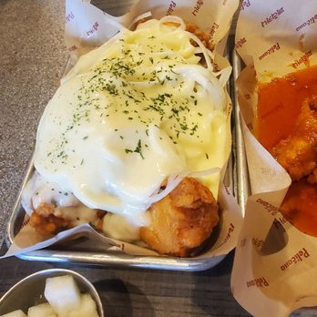 Seoul Kitchen - Snow onion wings. I could drink this sauce. The onions paired with the chicken is chefs kiss - Korean Near Me - Rockville, Maryland Seoul Kitchen - Snow onion wings. I could drink this sauce. The onions paired with the chicken is chefs kiss - Korean Near Me - Rockville, Maryland
