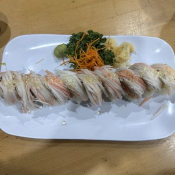 Pier 62 Oceanfront Restaurant & Bar - Forgot the name of it but has salmon, tuna , hamachi, cream cheese, avocado and crab and yuzu pearls on top - Seafood Near Me - Cocoa Beach, Florida