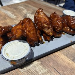 The Owners Box Sports Bar & Grill - 12 smoked wings in their version of Asian sauce- Really good