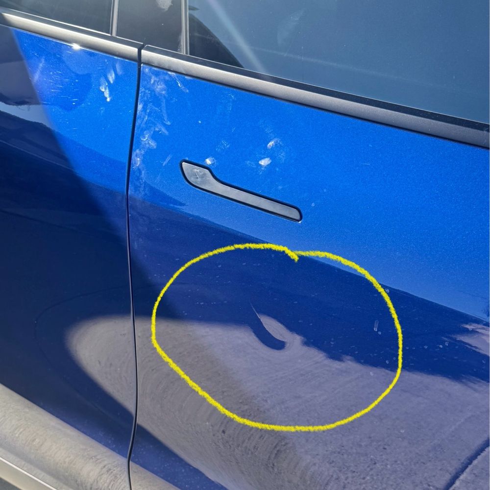 Dent Man - This is the picture of the damage from the dent before they worked on it - Body Shops Near Me - Santa Clarita, California