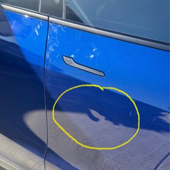 Dent Man - This is the picture of the damage from the dent before they worked on it - Body Shops Near Me - Santa Clarita, California