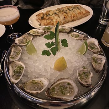 RPM Steak - Chilled Oysters*, Truffled Cheese-Baked Focaccia - Steakhouses Near Me - Chicago, Illinois