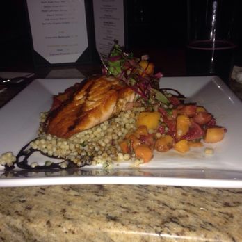 Novellas - Baked Atlantic Salmon with Strawberry and Mango Chutney Balsamic Sugo and Israeli Cous. - American Near Me - New Paltz, New York Novellas - Baked Atlantic Salmon with Strawberry and Mango Chutney Balsamic Sugo and Israeli Cous. - American Near Me - New Paltz, New York