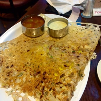 Udupi Palace Restaurant - Rava Masala Dosa - Indian crepes made of wheat semolina, with a potato filling. Chutney and Sambhar as dips - Vegetarian Near Me - Chicago, Illinois Udupi Palace Restaurant - Rava Masala Dosa - Indian crepes made of wheat semolina, with a potato filling. Chutney and Sambhar as dips - Vegetarian Near Me - Chicago, Illinois