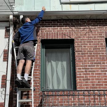 R&A Home Improvements - R&A Home Improvement Reed taking a videyy - Gutter Services Near Me - Saint James, New York R&A Home Improvements - R&A Home Improvement Reed taking a videyy - Gutter Services Near Me - Saint James, New York