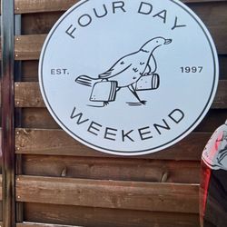 Four Day Weekend Comedy - Sign in front of entrance (the BACK OF STAGE WEST)