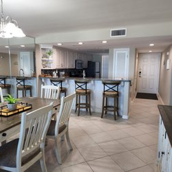 Dining and kitchen area, washer and dryer in back!