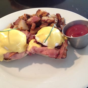 Blu Jam Cafe - Blu Jam Benedict.  Poached eggs on a toasted English muffin with Black Forest Ham, crispy bacon, topped with hollandaise. - Breakfast & Brunch Near Me - Sherman Oaks, California