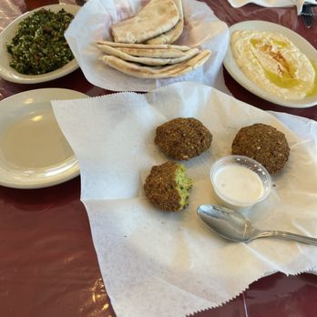 Babylon - Appetizers of tabouleh, hummus and falafel, served with warm pita bread - Mediterranean Near Me - Johnson City, Tennessee Babylon - Appetizers of tabouleh, hummus and falafel, served with warm pita bread - Mediterranean Near Me - Johnson City, Tennessee
