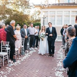 Amour Florist & Bridal - We lined our aisle with rose petals and trio floating candles, which were repurposed for centerpieces in the reception