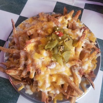 Coyote Bluff Cafe - Small cheese fries that's about a 7" plate - Burgers Near Me - Amarillo, Texas